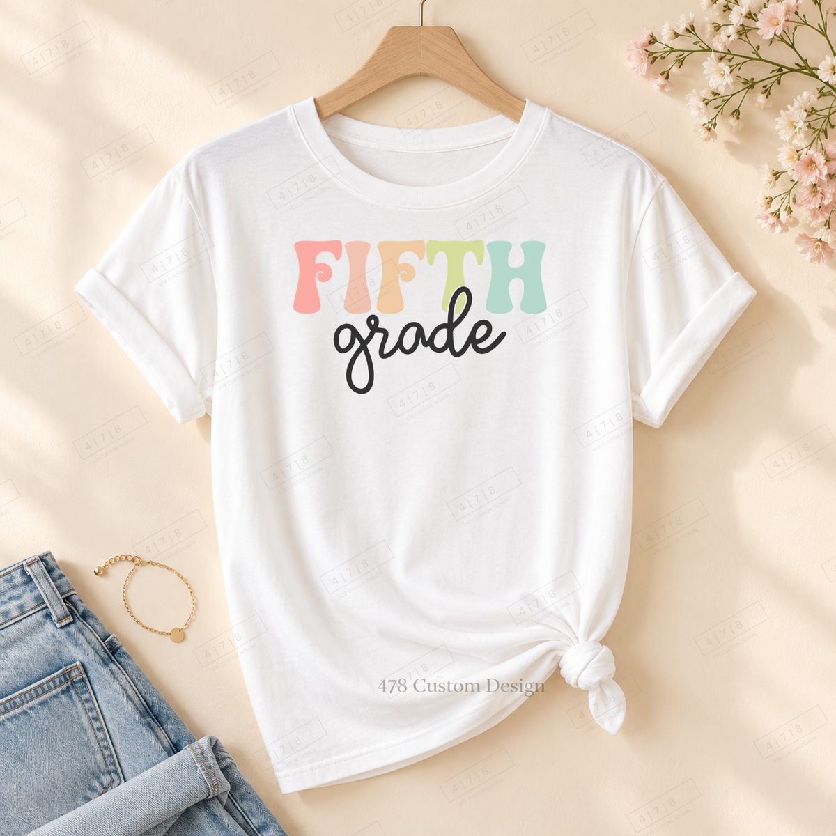 Fifth Grade cutout design on rolled-sleeve tied white tee with 478 watermark