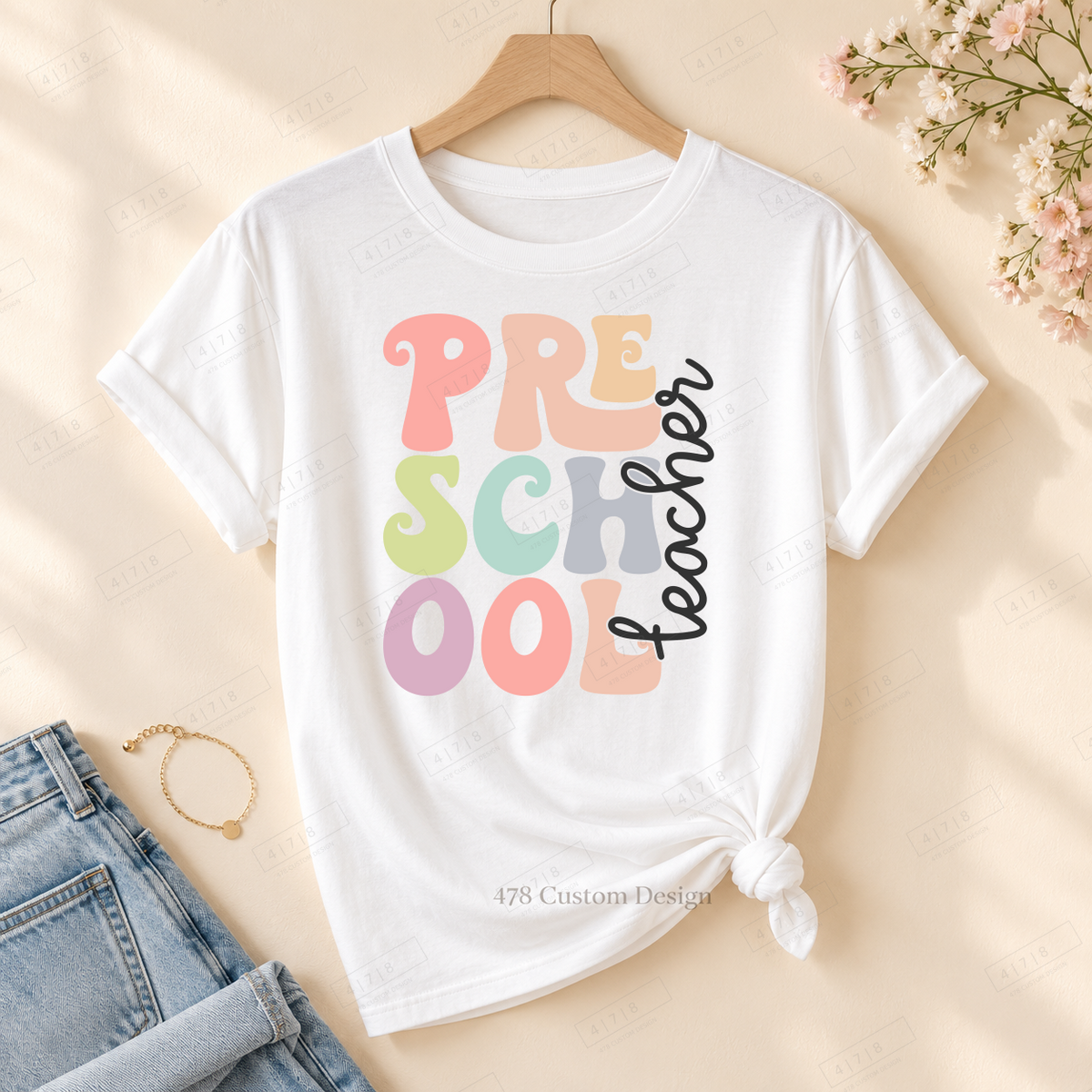 Preschool cutout design on rolled-sleeve tied white tee with 478 watermark