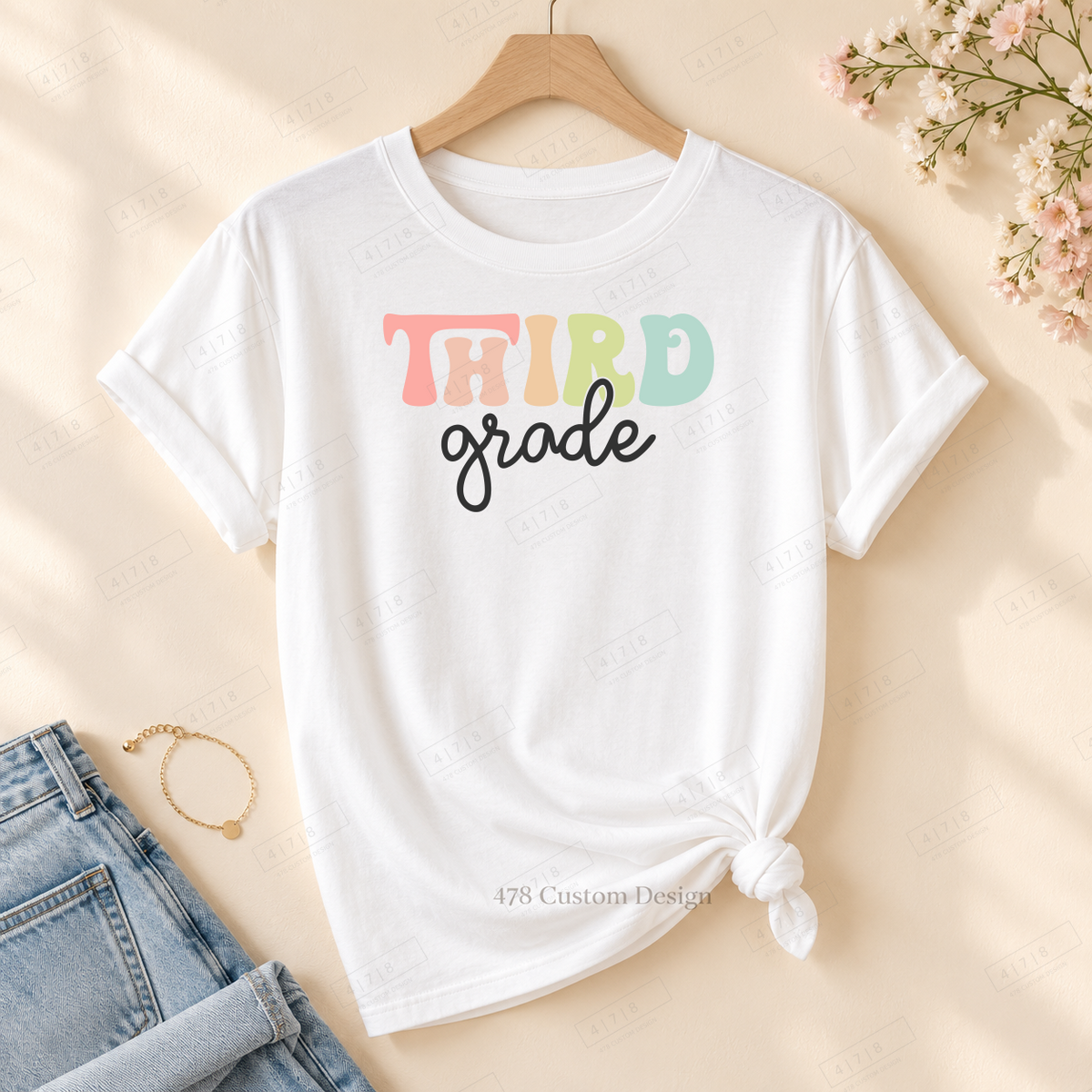 Third Grade cutout design on rolled-sleeve tied white tee with 478 watermark
