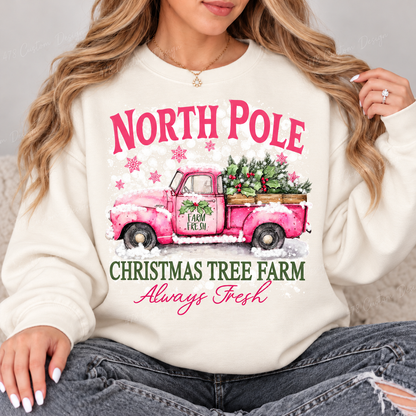North Pole Pink Truck Christmas Tree Farm Top design on a Ivory crewneck sweatshirt