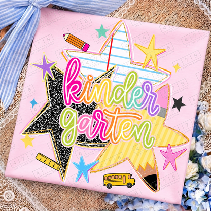 Kindergarten rainbow school stars design on a pink folded shirt