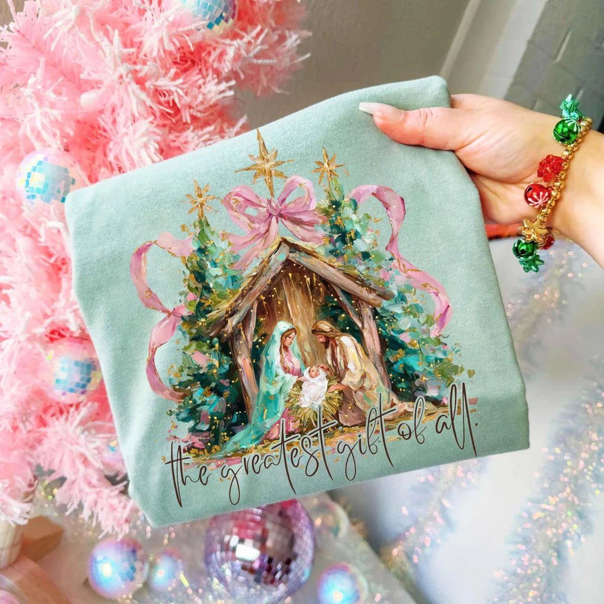 The Greatest Gift Pastel Bow Nativity Christmas Top — apparel mockup 1