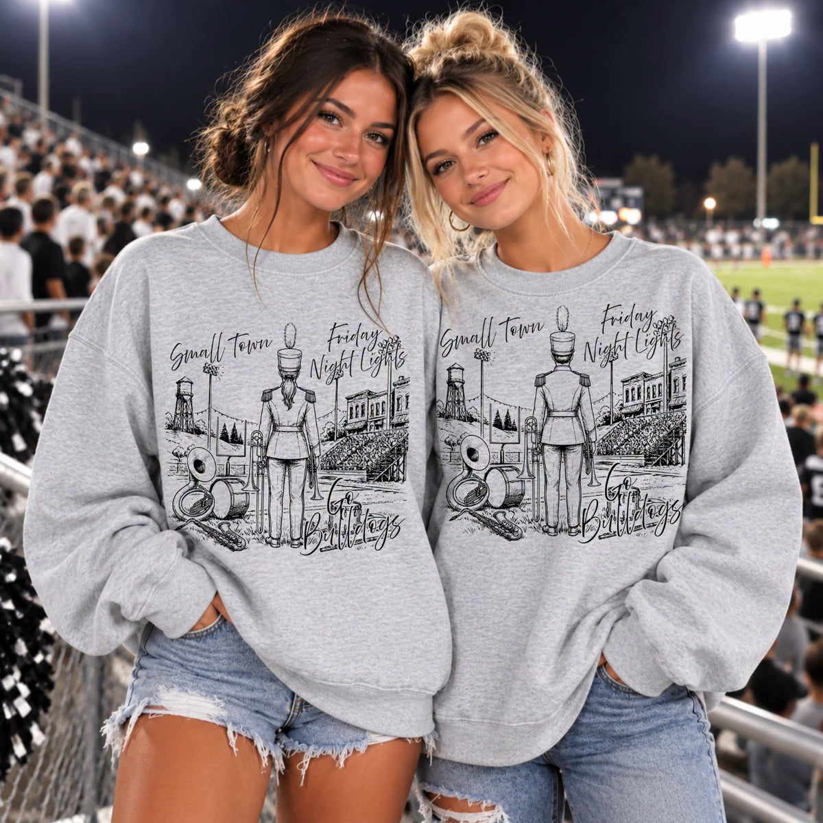 Custom band Friday Night Lights design shown on two girls in gray crewneck sweatshirts