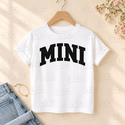 002 Mini SMOOTH blk on a white shirt