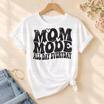 003 Mom Mode DISTRESSED blk on a white shirt