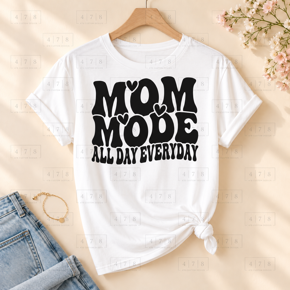 003 Mom Mode SMOOTH blk on a white shirt