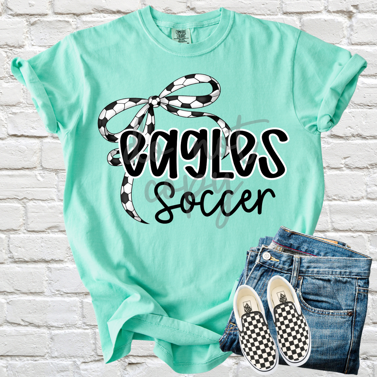 Custom Thin Soccer Bow Top mockup showing the pictured apparel design.