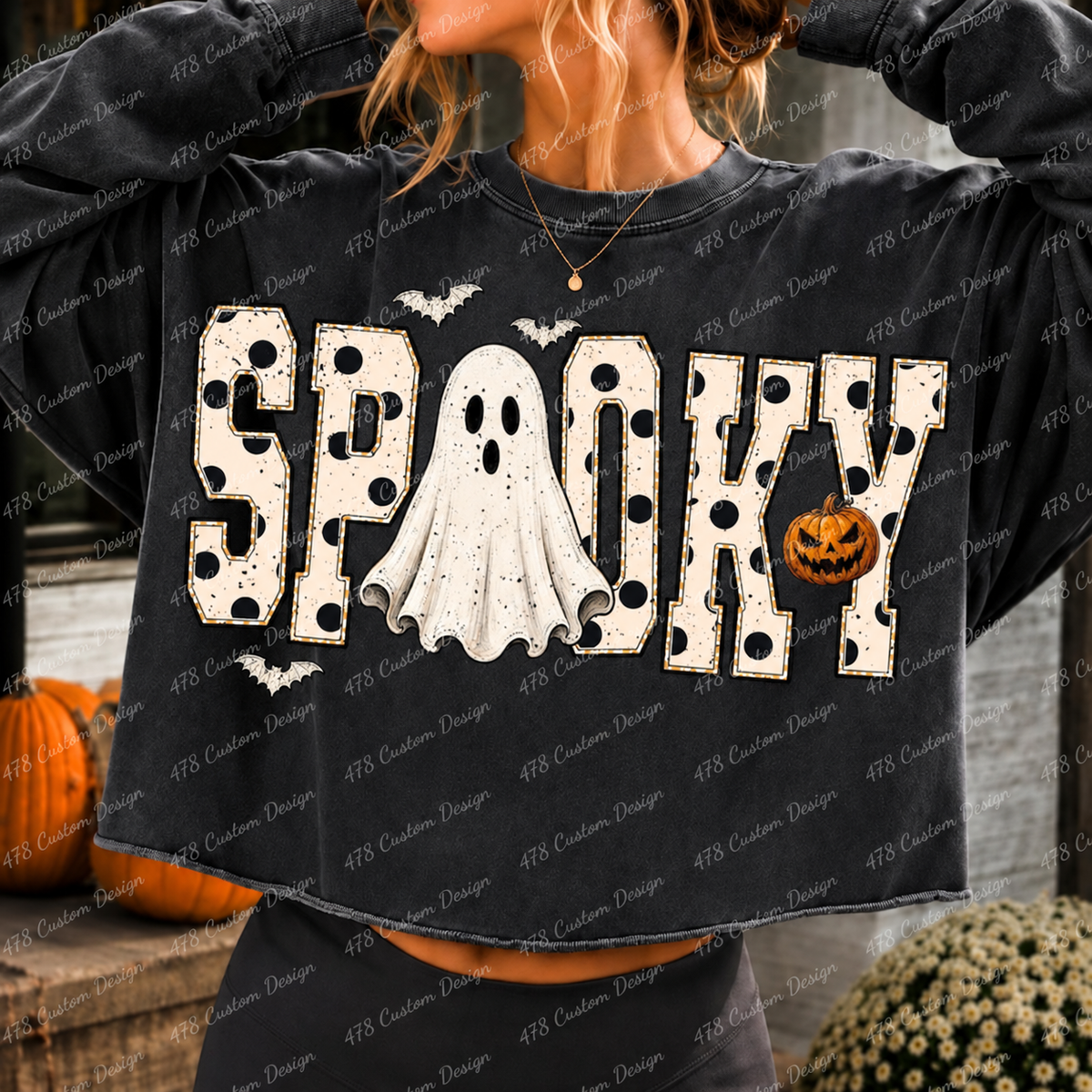 Spooky ghost Halloween design on a charcoal sweatshirt